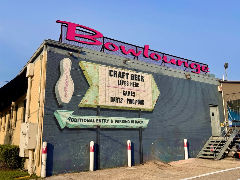 Main marquee sign on corner of Sway Bowlounge